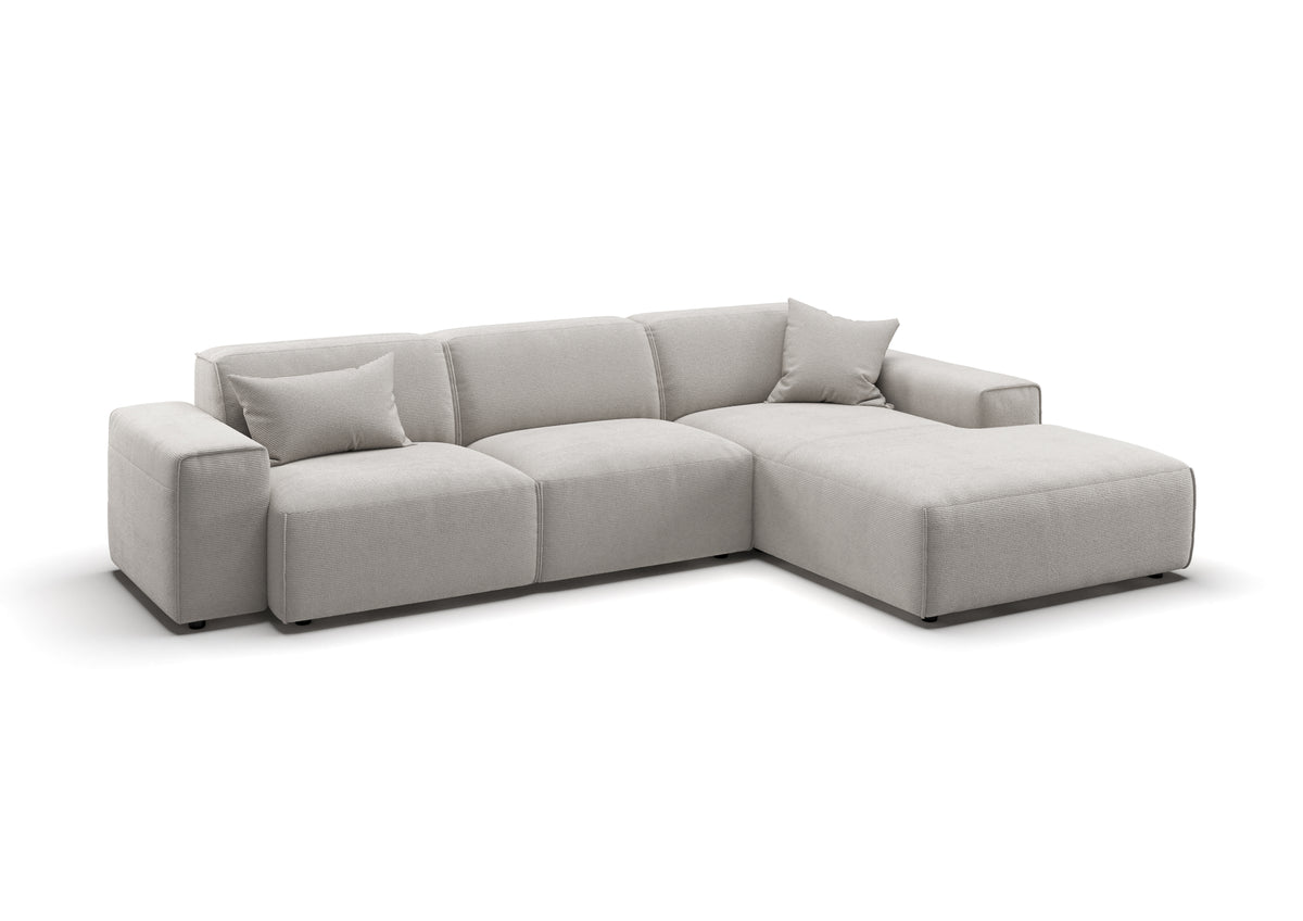 Lund Ecksofa mit Ottomane in Feincord Weiß, Ottomane rechts – mit Dekokissen