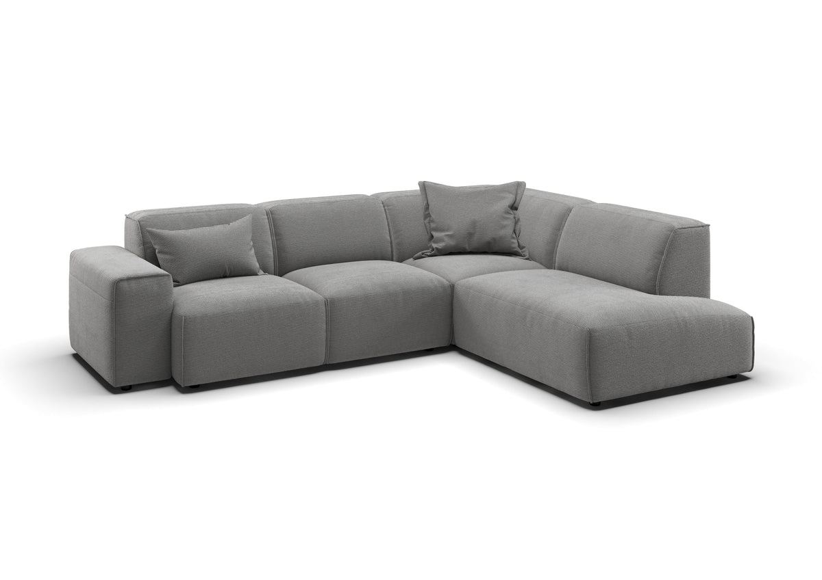 Lund Ecksofa in L-Form in Feincord Grau, Ecke rechts – mit Dekokissen
